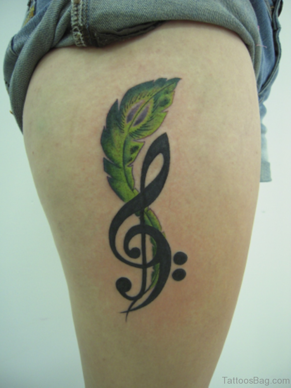 Green Feather Tattoo On Thigh