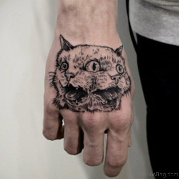 Grey Ink Cat Tattoo