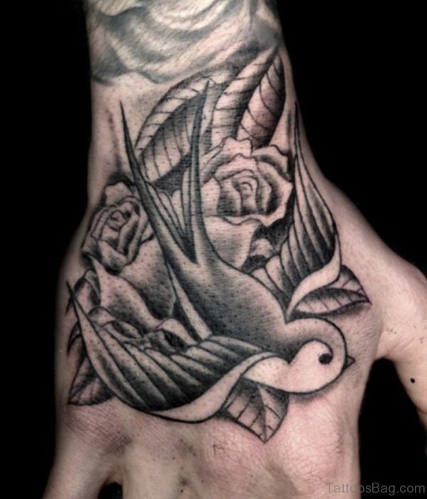 Grey Ink Swallow Tattoo