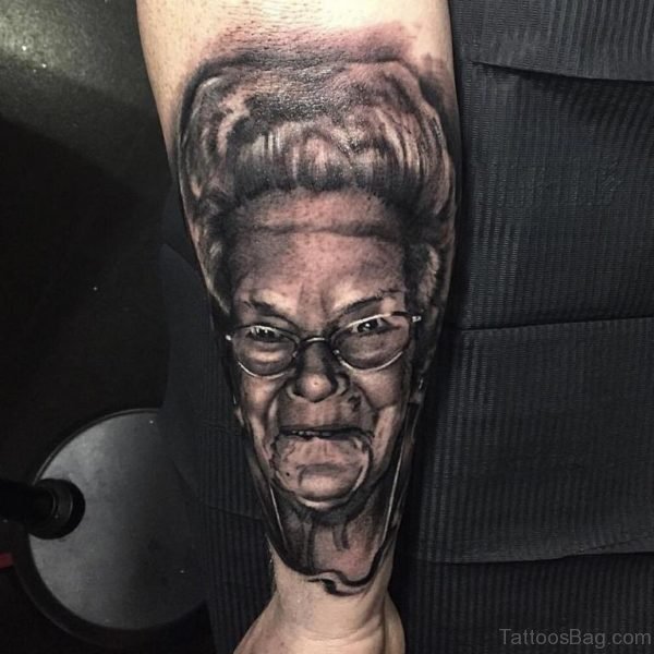 Grey Portrait Tattoo On Wrist