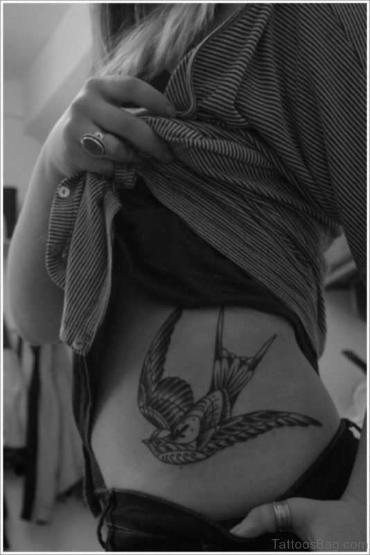 Grey Swallow Tattoo On Waist