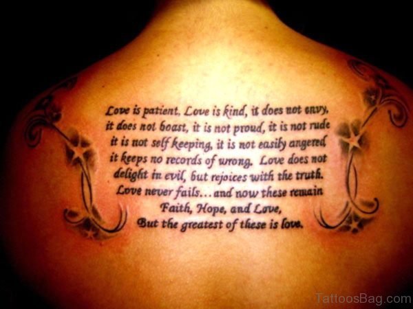 Lettering With Scroll Tattoo On Back