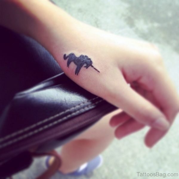 Little Black Unicorn Tattoo On Hand