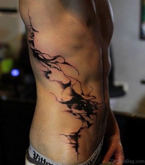 Masculine Ribcage Tattoo