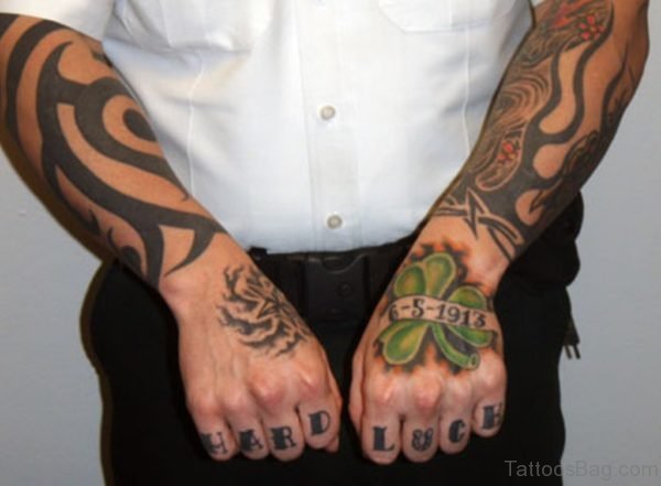 Memorial Banner And Clover Leaf Hand Tattoo