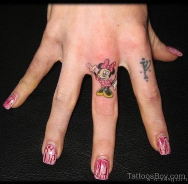 Minnie Tattoo On Middle Finger