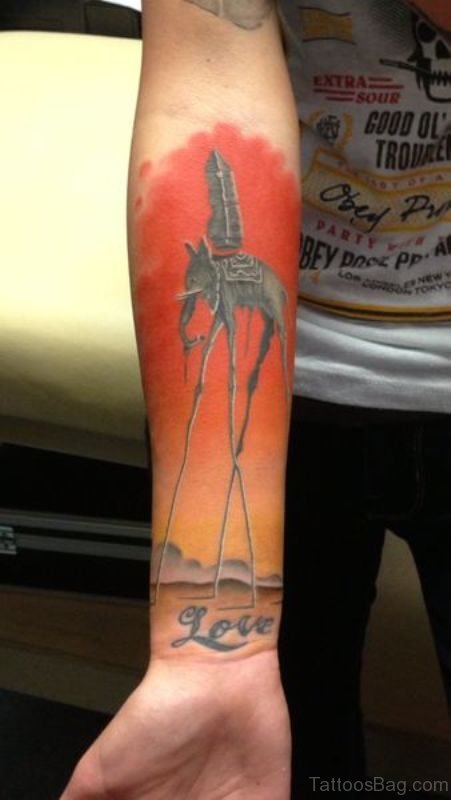 Nice Dali Elephant Tattoo On Forearm