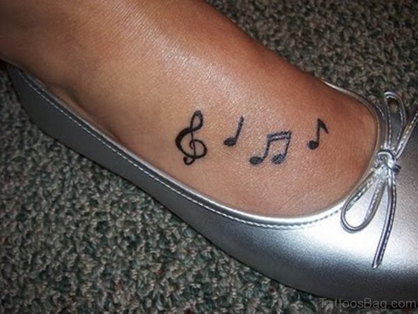 Nice Musical Note Tattoo Design