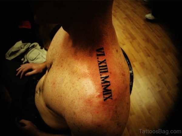 Numeral Roman Tattoo On Left Shoulder