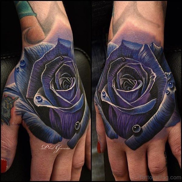 Outstanding Blue Rose Tattoo On Hand