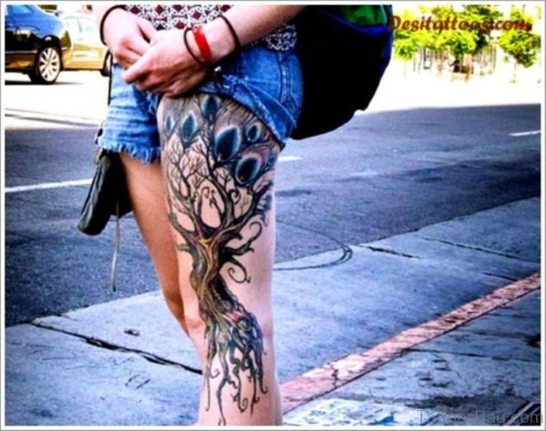 Peacock Feather Tree Tattoo On Thigh
