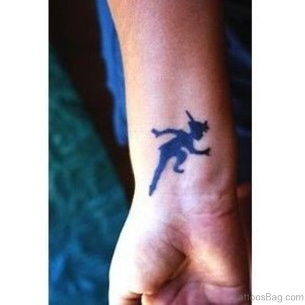 Peter Pan Running Tattoo On Wrist