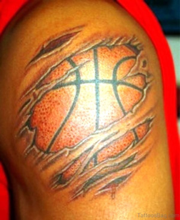 Ripped Skin Basketball Tattoo On Shoulder