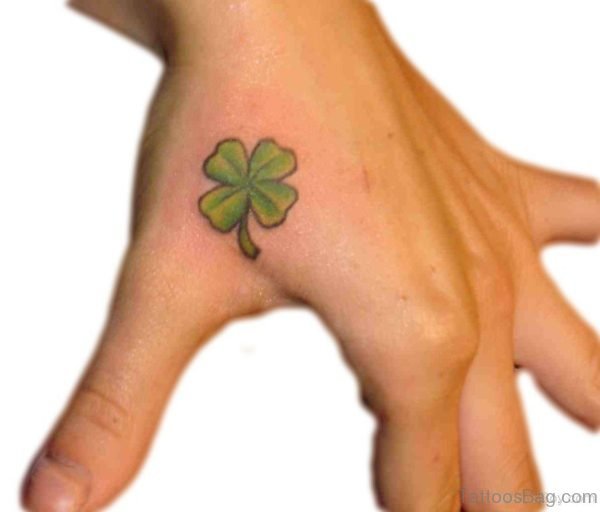 Simple Green Shamrock Leaf Tattoo On Hand