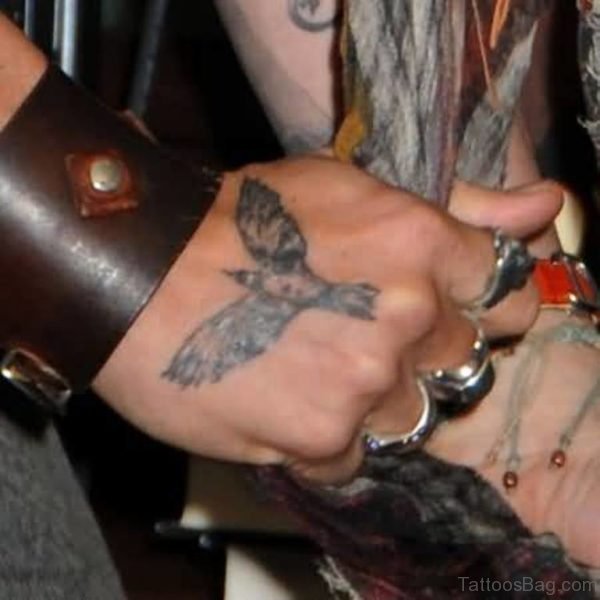 Simple Grey Ink Flying Eagle Tattoo Make On Hand
