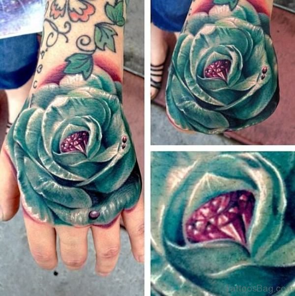 Sky Blue Rose Hand Tattoo