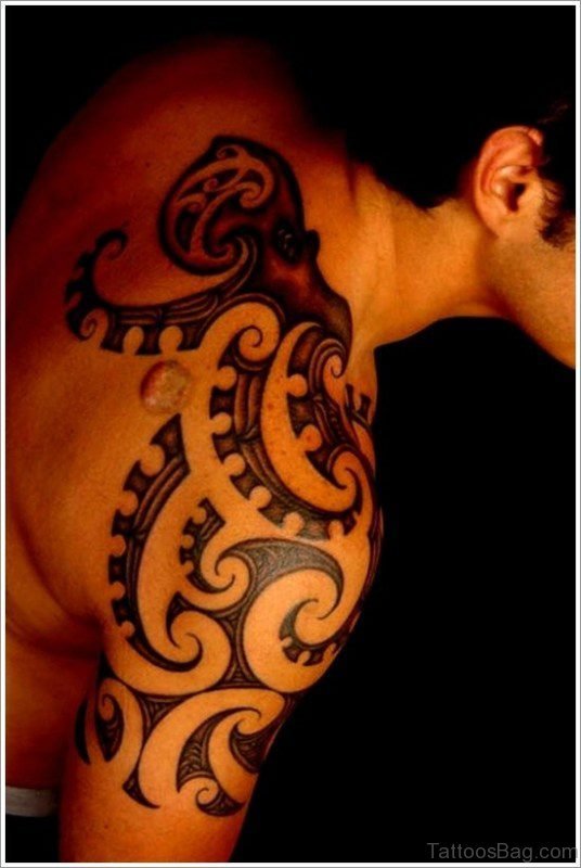 Stunning Shoulder Joint Tribal Tattoo
