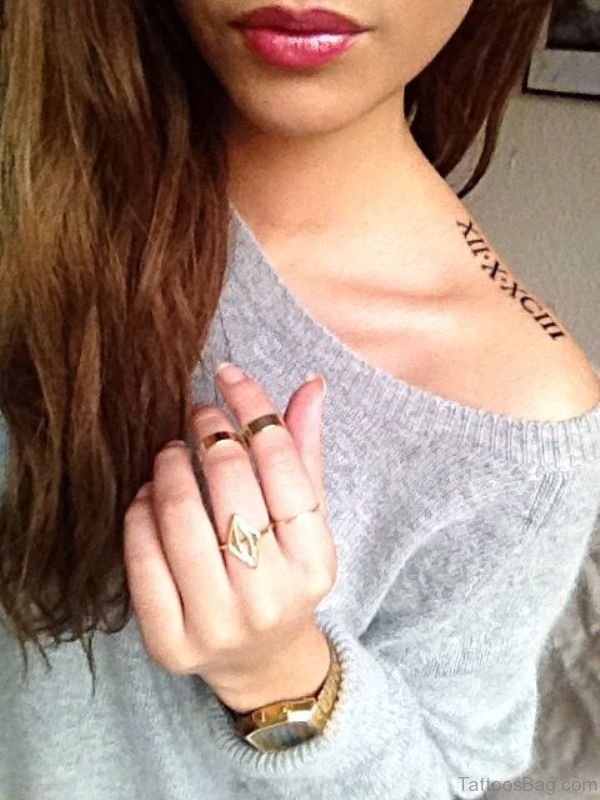 Sweet Roman Numeral Shoulder Tattoo