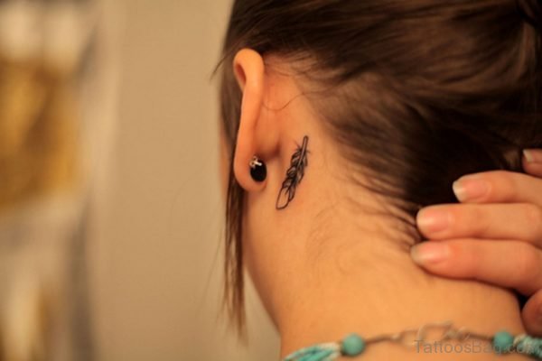 Tiny Feather Tattoo On Nape