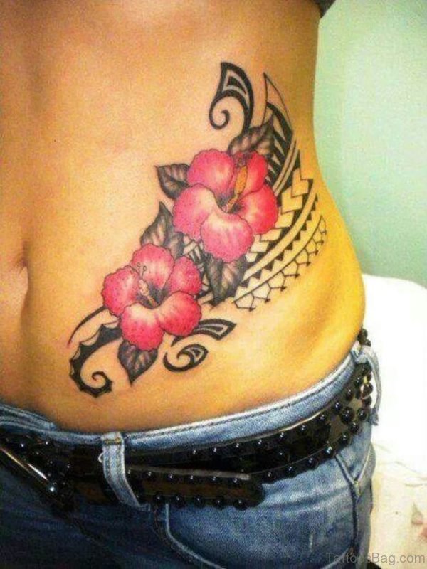 Tribal Hibiscus Tattoo On Waist