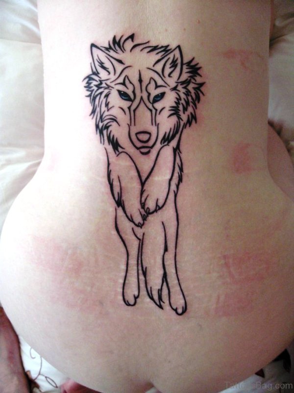 Tribal Outline Alpha Wolf Tattoo On Lower Back