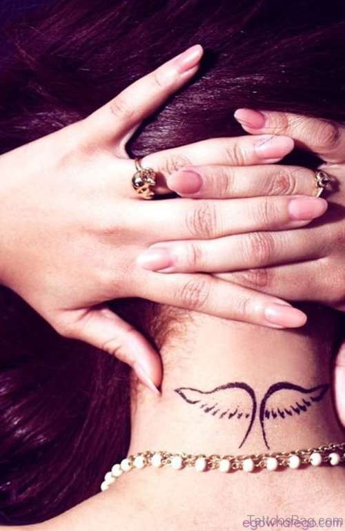 Wings Tattoo On Nape Image