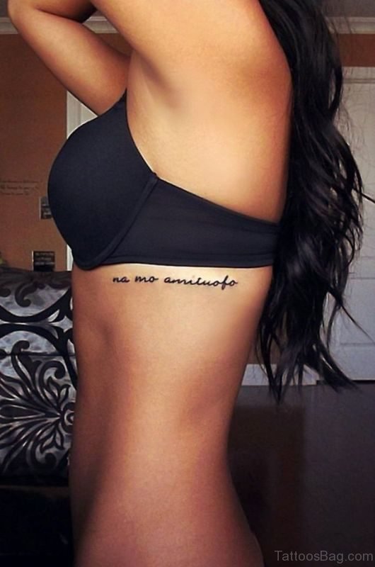 Word Tattoo On Rib 