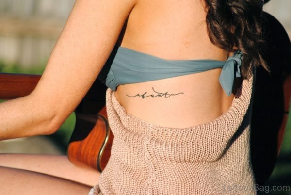 Word Tattoo On Rib 
