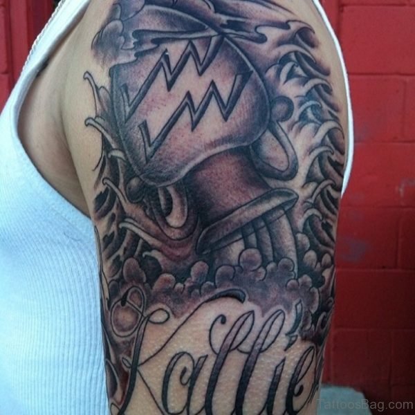 Zodiac Aquarius And Waves Tattoo On Shoulder