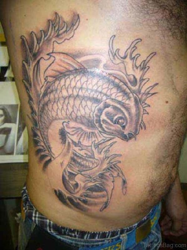 Grey Fish Tattoo On Rib