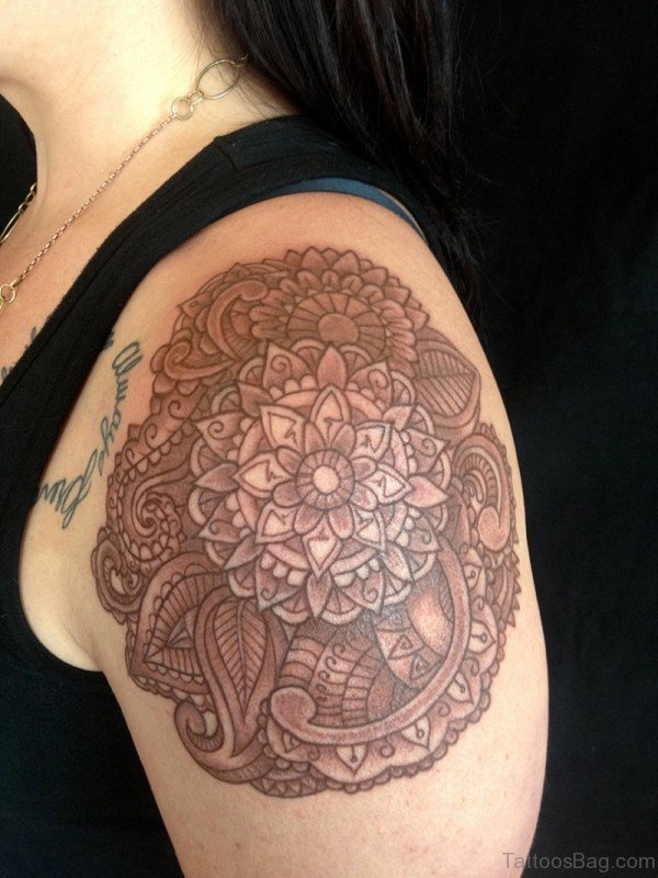 Amazing Brown Flower Tattoo On Shoulder
