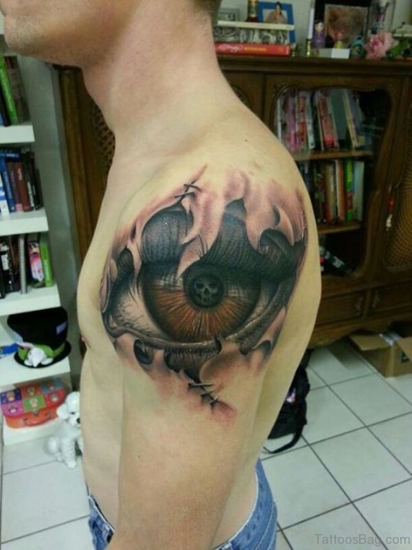 Big Brown Eye Tattoo On Shoulder
