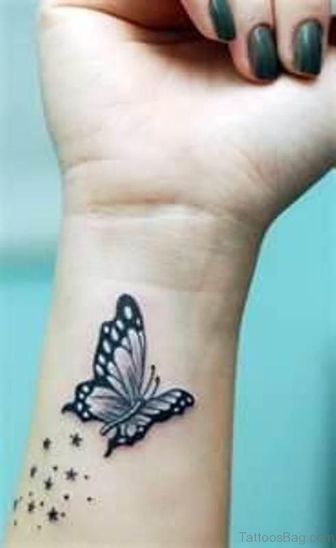 Black Butterfly And Star Tattoo On Wrist