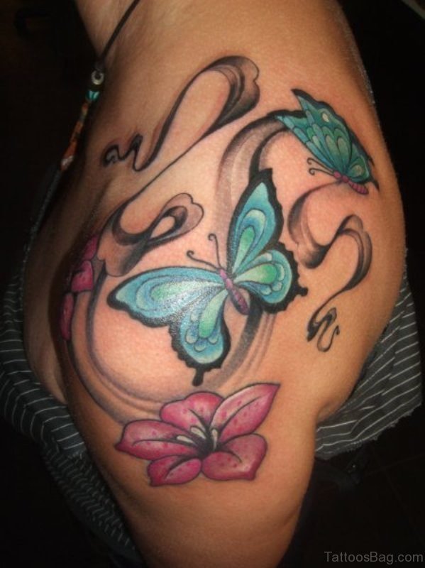 Blue Butterfly ANd Flower Tattoo On Shoulder