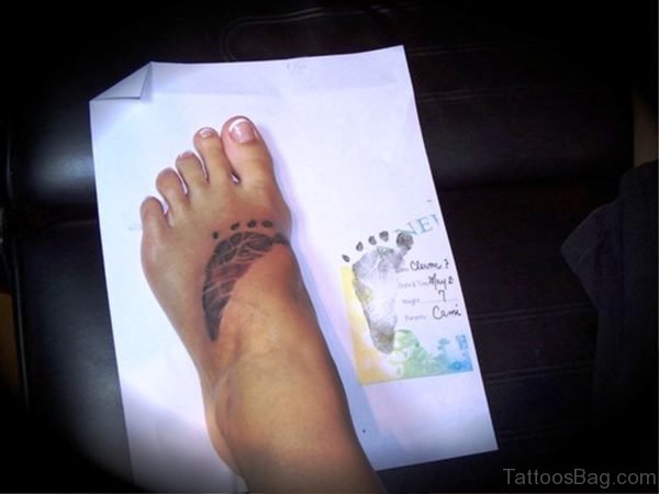 Elegant Baby Footprint Tattoo 1