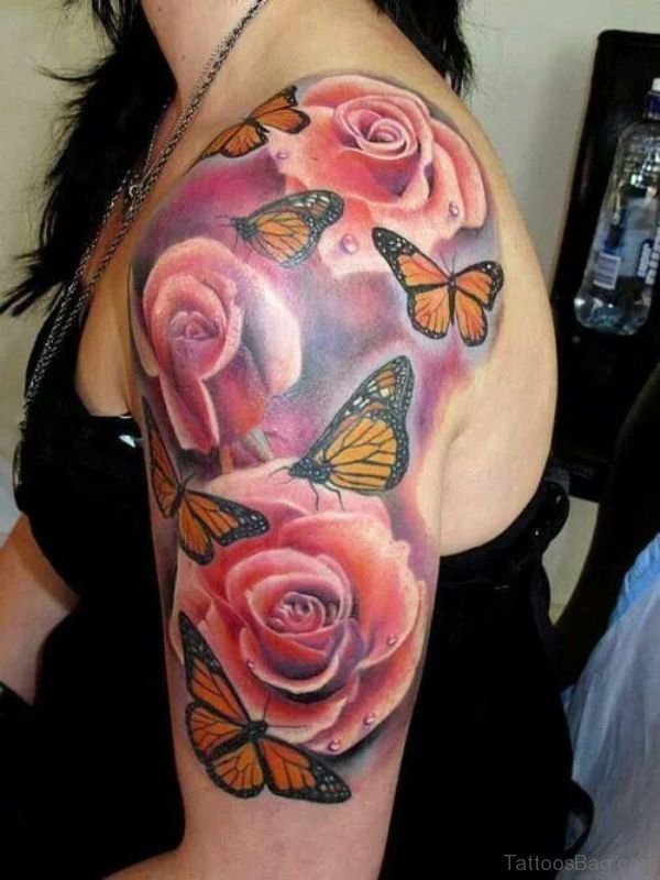 Magnifying Butterfly And Flower Tattoo On Shoulder