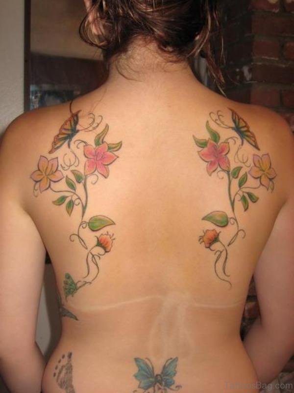 Nice Butterfly And Flower Tattoo On Shoulder Blade