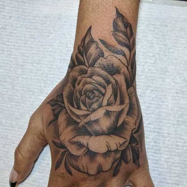 Blackwork Rose Hand Tattoo