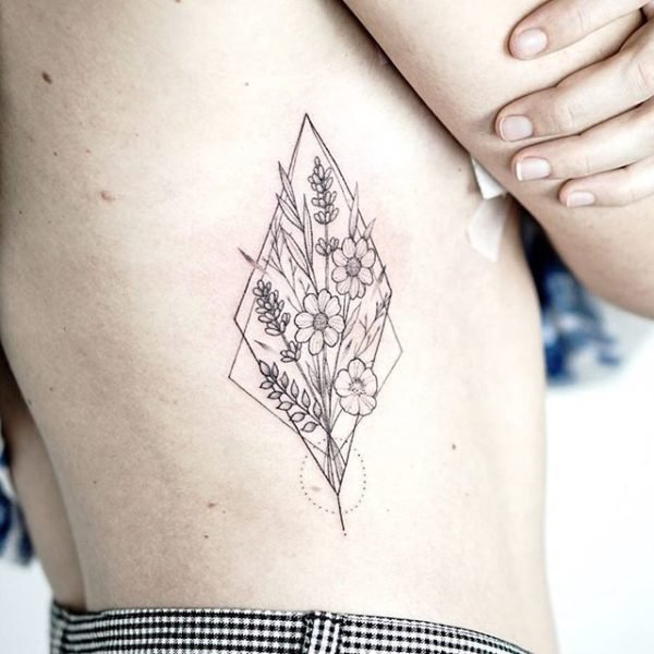 Rib Flower Tattoo