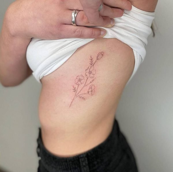 Rib Floral Tattoo