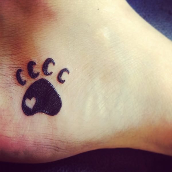 Heart Shape In Paw Print Tattoo