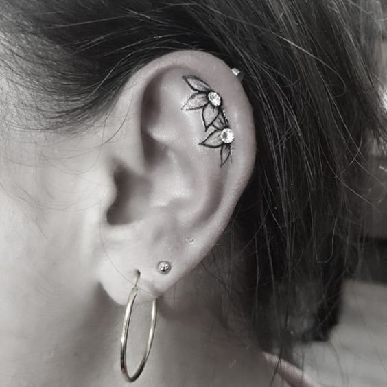 Ear Tattoo Piercing