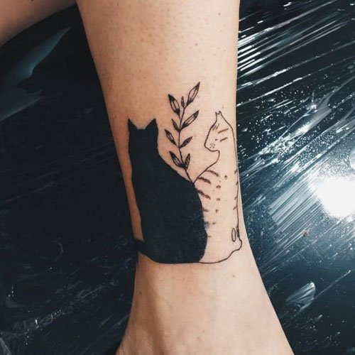 Cat Silhouette With Plants Tattoo
