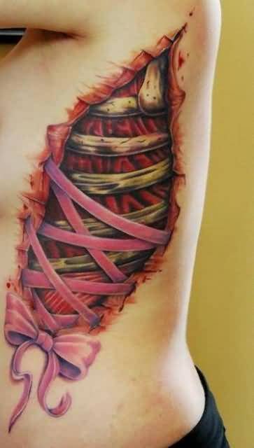 Realistic Bow And Corset Tattoo